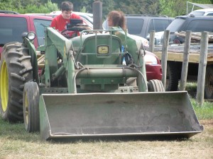 Clay sitting on tractor