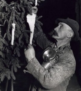 Man decorating tree